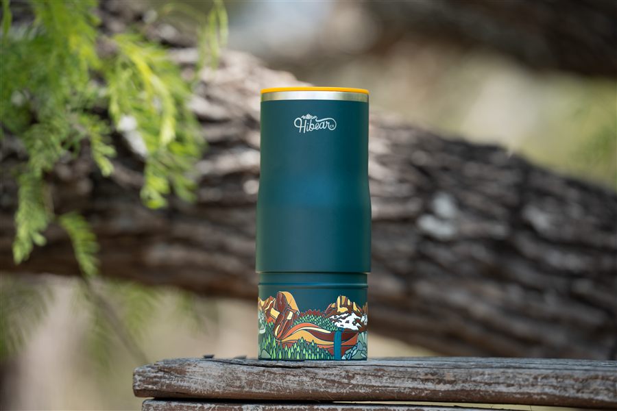 Hibear adventure flask on a wooden fence